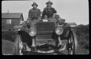 Image of Two men in car